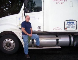 Larry with current truck - his old one lasted more than 1 million miles/submitted photo